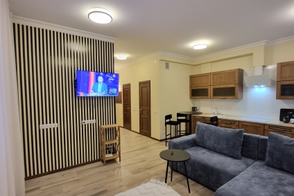 Большая студия в новом доме ,смарт TV, в Лебяжьем. До метро Немига 10 мин. на транспорте